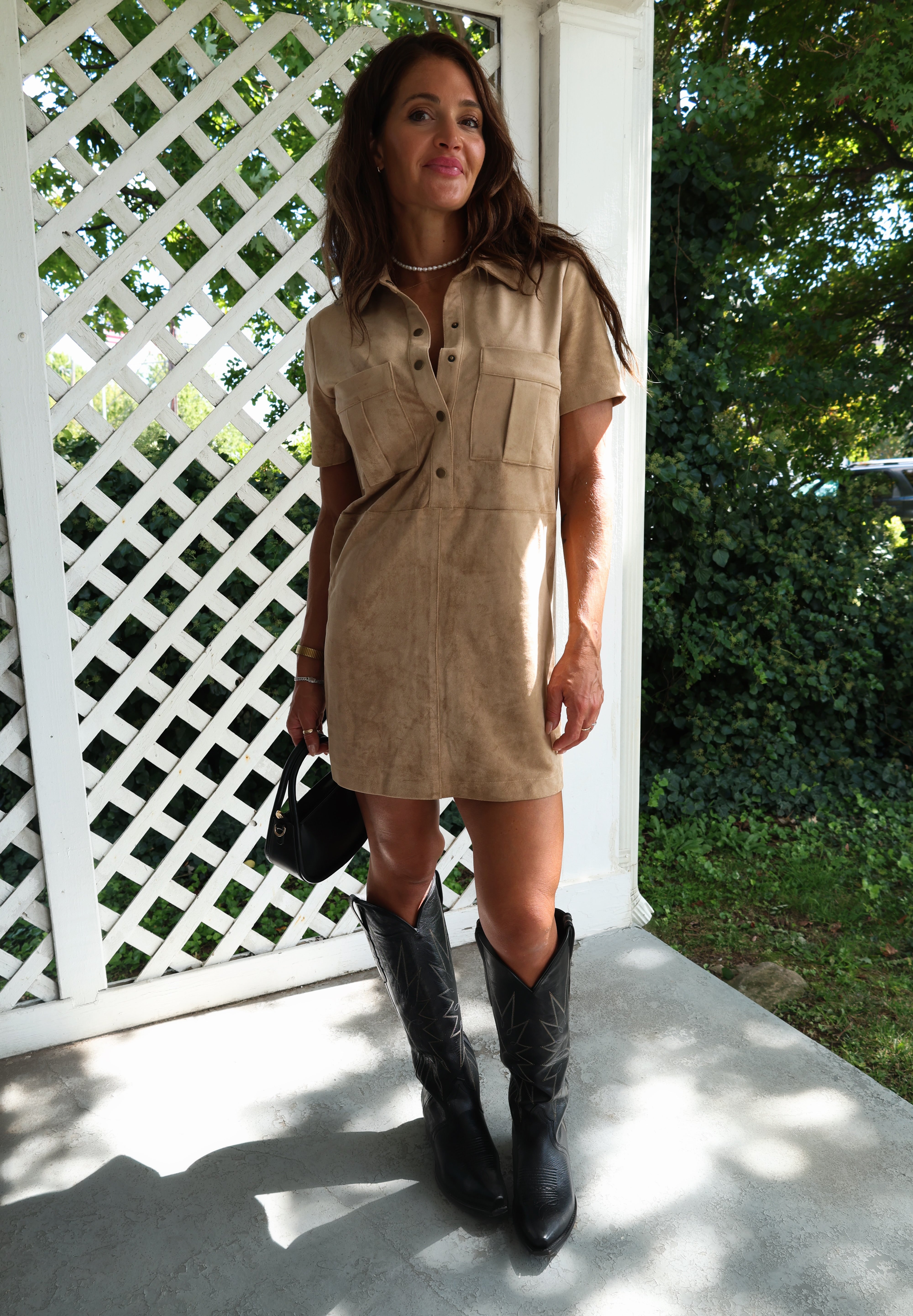 Women’s suede mini dress styled for fall date nights and special occasions
