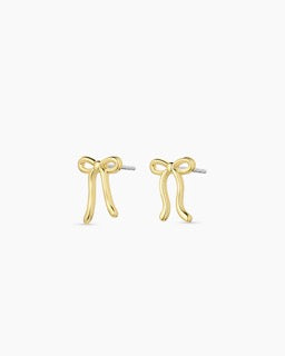 Gorjana Bow Earrings — delicate 18k gold-plated studs measuring ½” x 5/16”, featuring a bow design with surgical steel post backs for everyday elegance.