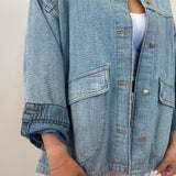Free People Lemon oversized denim jacket with contrast collar styled with neutral wide-leg pants