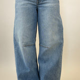 Pistola Sydney high rise bowed leg jeans in light wash denim with full-length wide silhouette