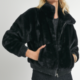 Sage the Label Daring jacket in black faux fur with a luxurious feel.