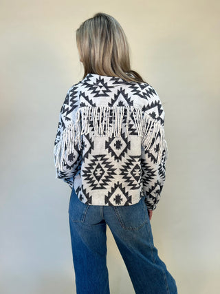 back of aztec fringe shacket/ jacket. black and white mystree 