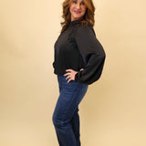 Z Supply long-sleeve Silvana top in black with a mock neck and feminine scalloped trim accents.