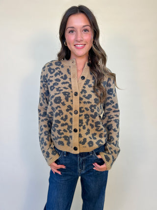 Front of Amina Sweater by Dear John- Leopard print cardigan, tan with black cheetah pattern, button down front. Women's trendy cardigan from Shear Boutique Fall collection