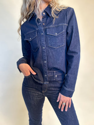 Women’s Thea Denim Shirt — soft wash denim with a relaxed yet refined silhouette, ideal over a tank or tee.