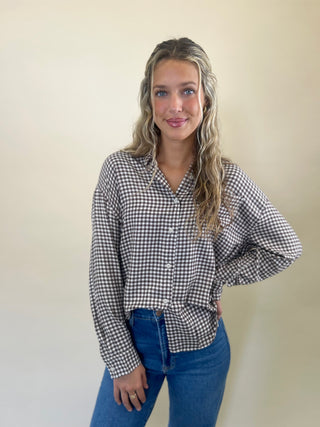 Blue and white plaid Z Supply River Button-Up Shirt with a relaxed fit, collared neck, front buttons, long sleeves, and one chest pocket—crafted from a soft, lived-in fabric.