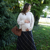 Crestview women’s plaid skirt paired with boots for a polished fall fashion look in Olney, MD