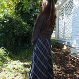 Timeless fall plaid skirt for women with a flattering silhouette from Shear Boutique in Olney, Maryland
