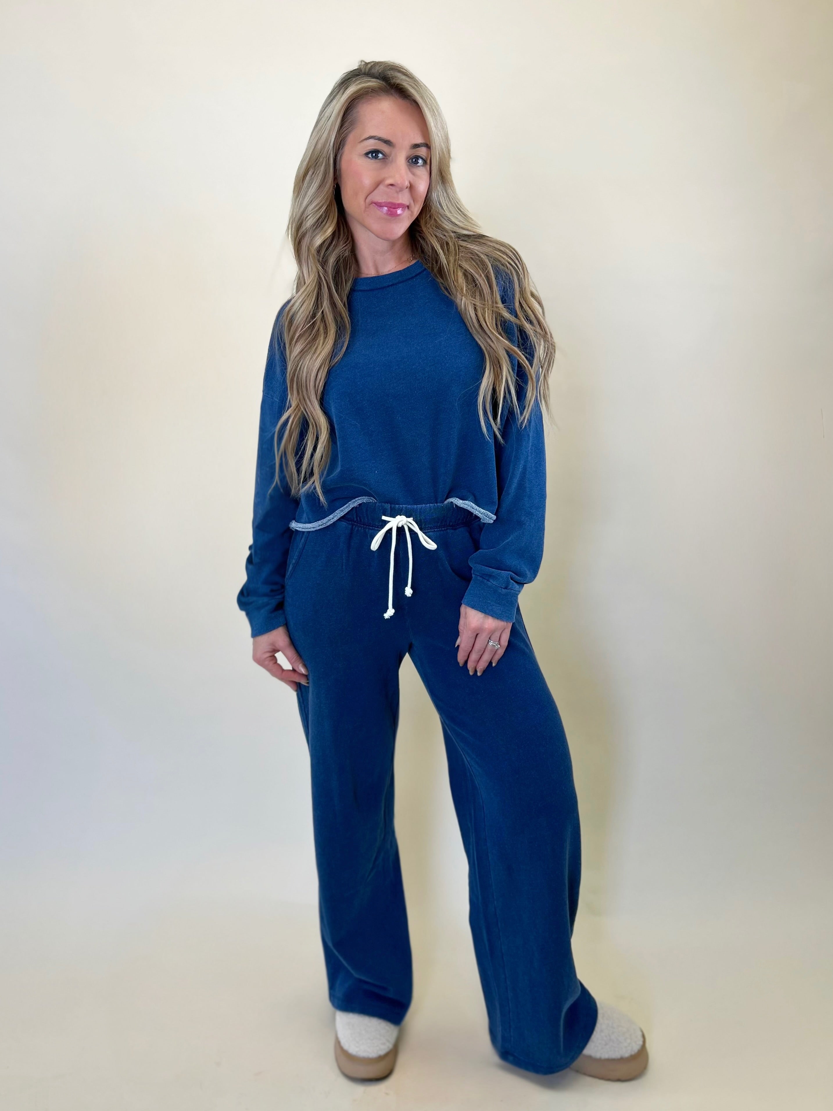 Cozy fall lounge look featuring Z Supply’s Hunter Knit Denim Pant and Circuit Sweatshirt, sold at Shear Boutique.