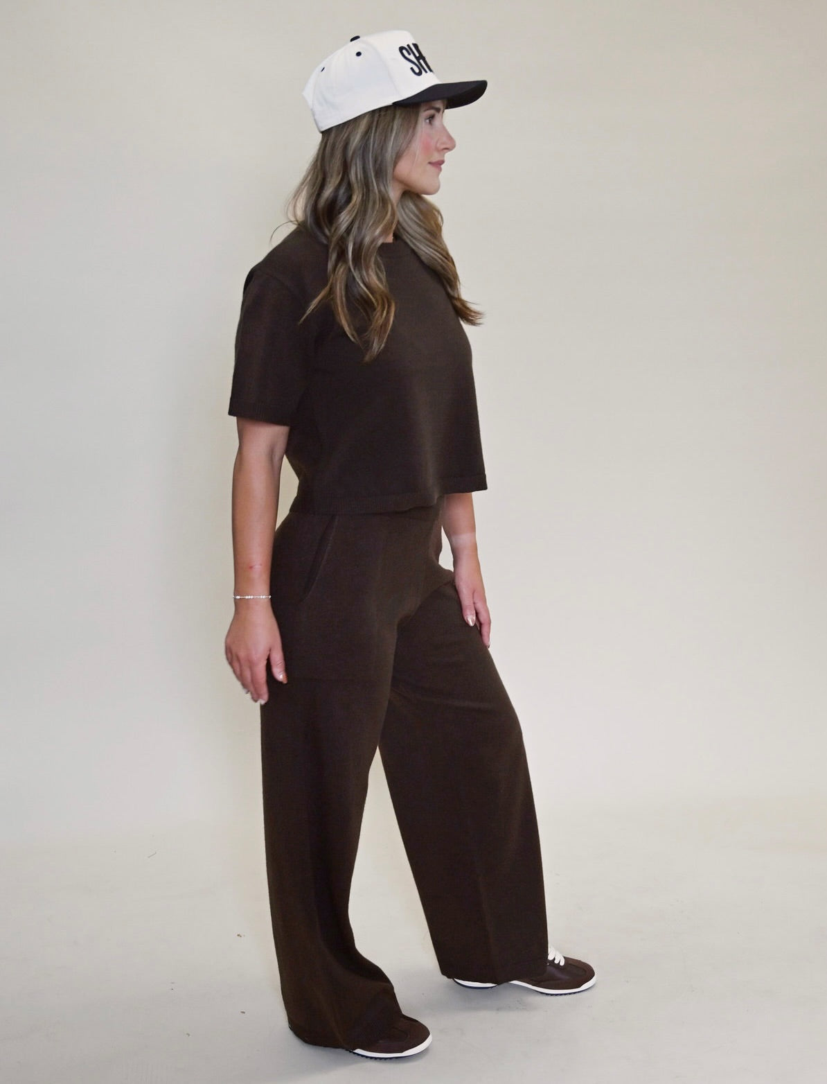 Three-quarter angle of women’s Kori Knit Wide Leg Pants and matching cropped sweater top in espresso brown.