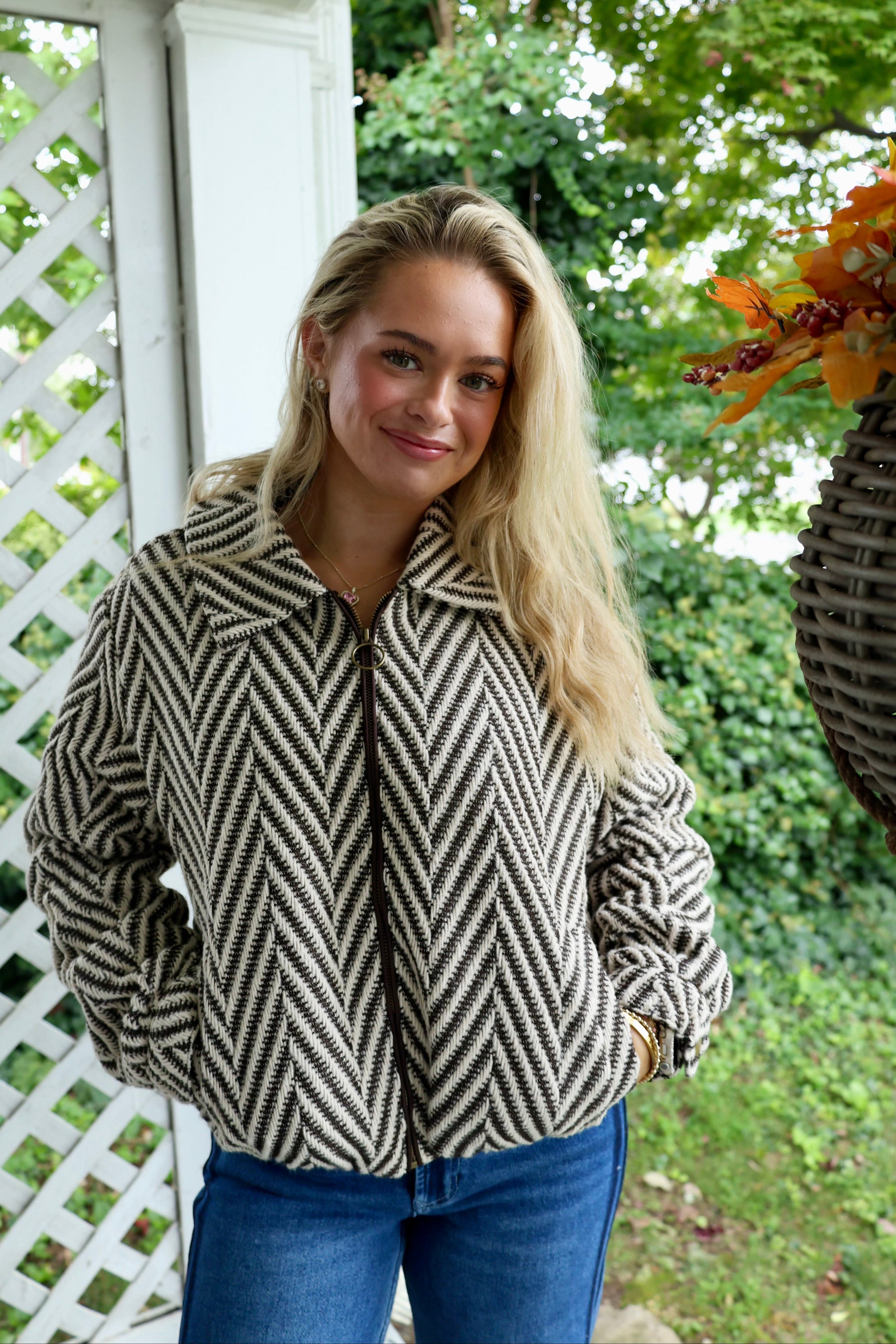 Model wearing the Dunaway Bubble Jacket in Dark Chocolate Chevron with a relaxed oversized fit.