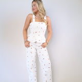Wide-leg denim jeans with allover floral print and vintage-inspired wash