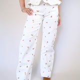 Statement floral print wide-leg jeans with relaxed fit and front pockets