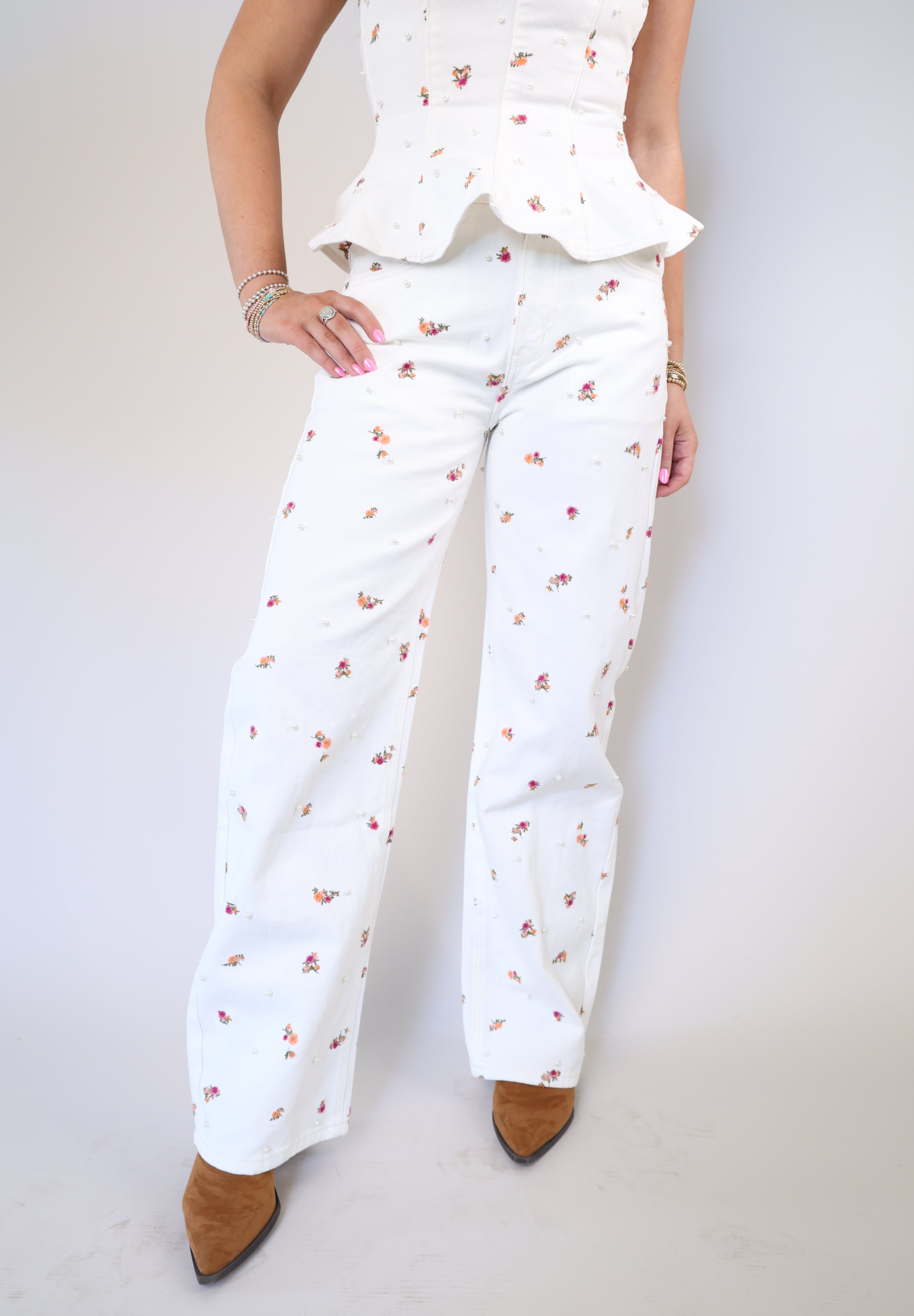 Statement floral print wide-leg jeans with relaxed fit and front pockets