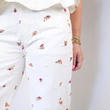 Women’s floral pattern denim jeans with wide-leg silhouette and vintage wash