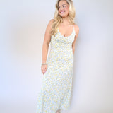 Soft stretchy floral maxi dress with shirred bodice and midi-maxi length for spring occasions