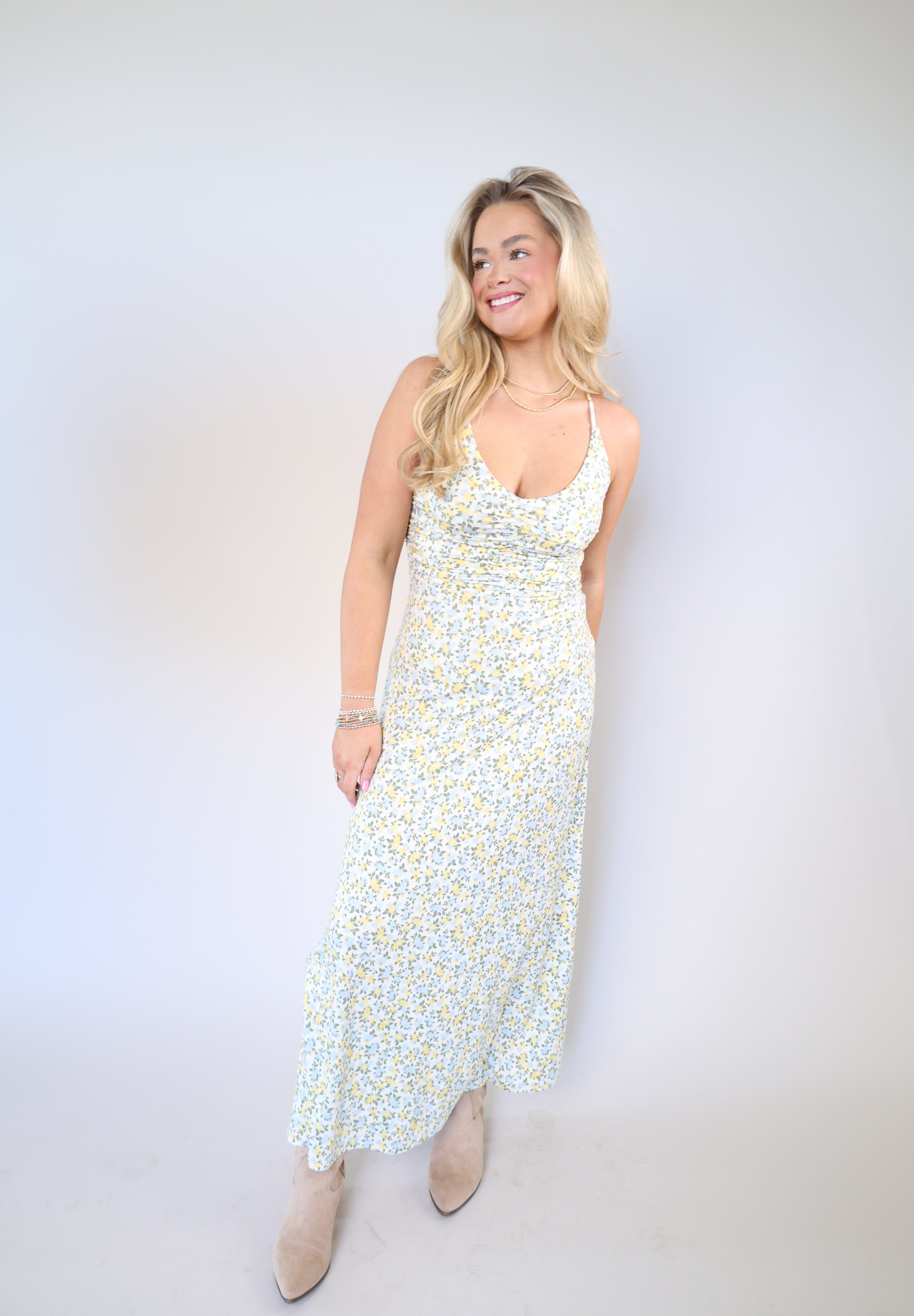 Soft stretchy floral maxi dress with shirred bodice and midi-maxi length for spring occasions