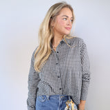 Gingham plaid cotton button-down shirt featuring a relaxed fit, collared neckline, and lightweight feel