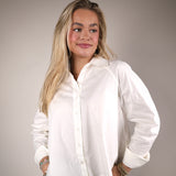Shear Boutique Spring 2026 white pearl button up blouse women’s classic shirt with pearl detail elevated top