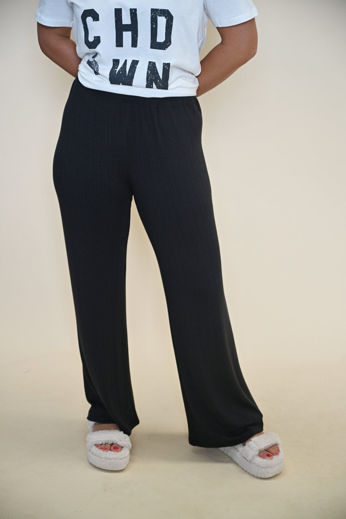 Elegant black wide-leg pants from Z Supply’s Luxe collection, designed with a relaxed drape and a dreamy, starry-inspired look.