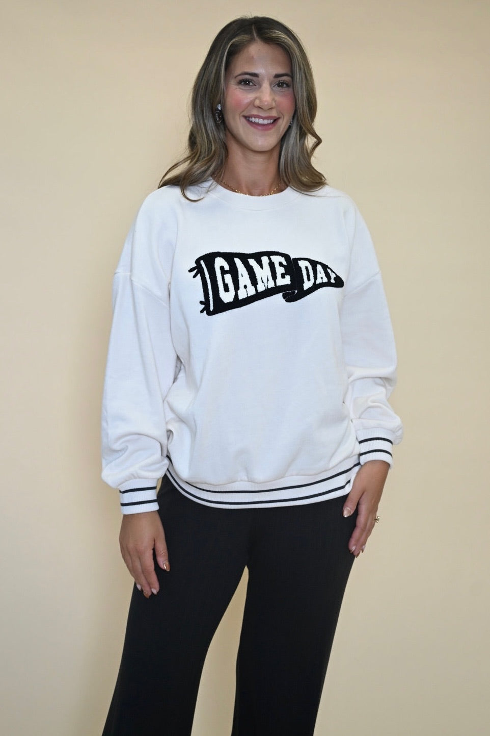 Z Supply Game Day Sweatshirt — oversized white crew neck with black striped sleeves, made from soft midweight cotton fleece for cozy everyday comfort.