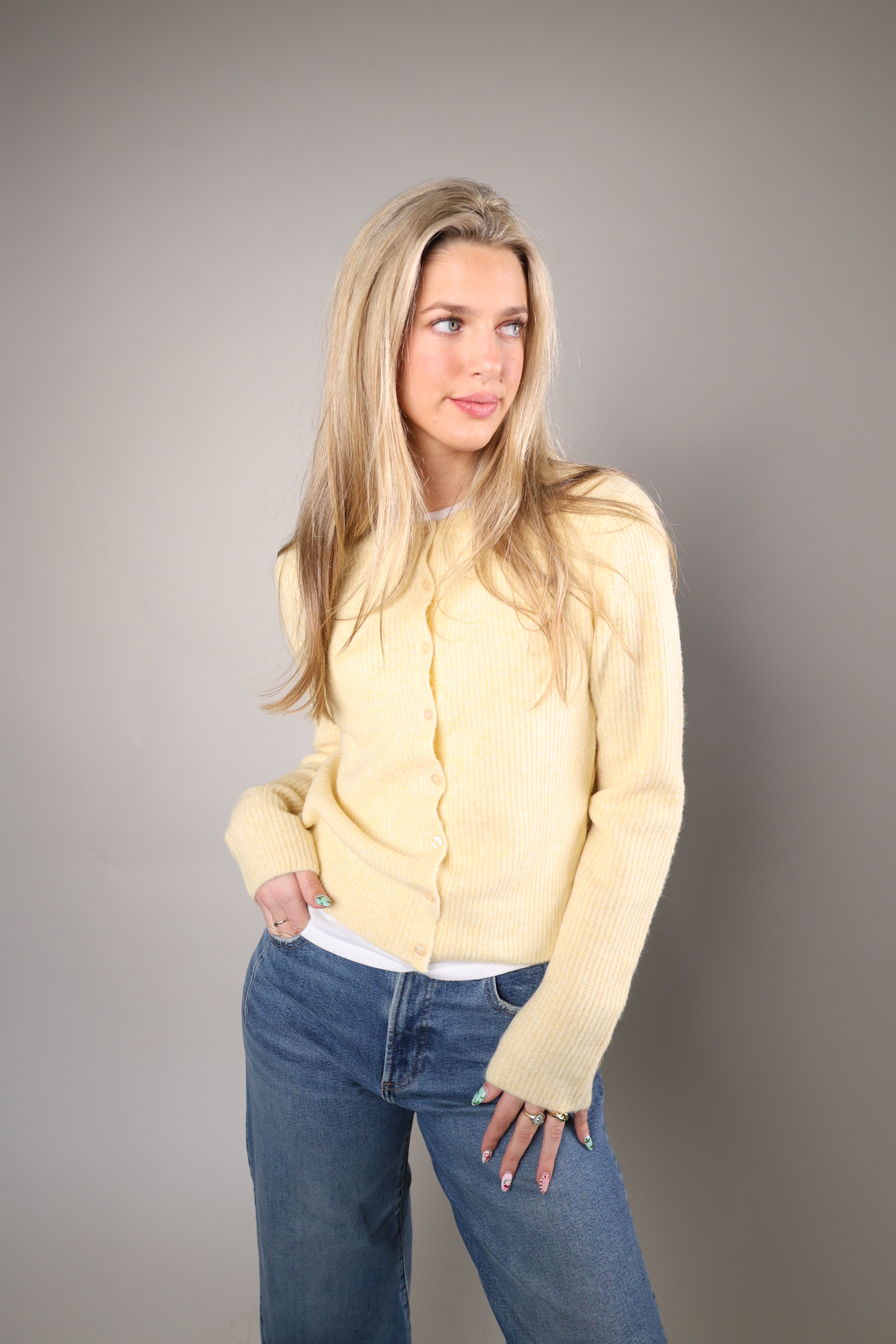 Yellow Z Supply Medina ribbed cardigan with a comfortable stretch, crew neckline, and button-front styling.
