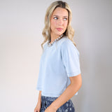 Z Supply cropped knit denim sweatshirt in vintage-inspired blue with relaxed silhouette.