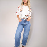 Free People Mountain View Graphic Tee with rustic outdoor illustrations and laid-back boho silhouette.