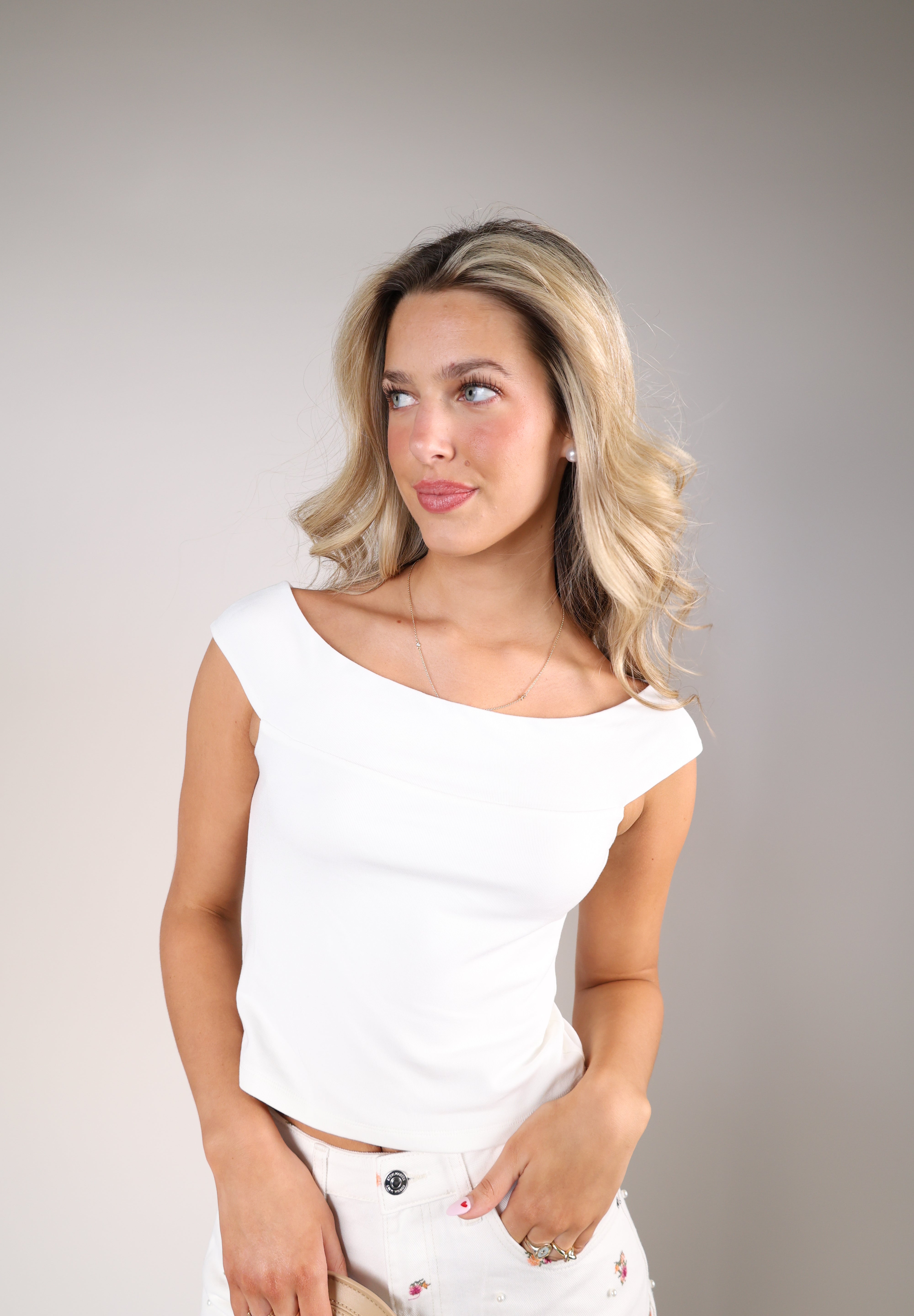 Z Supply Second Skin white off shoulder top styled with high-rise denim for a polished casual outfit.