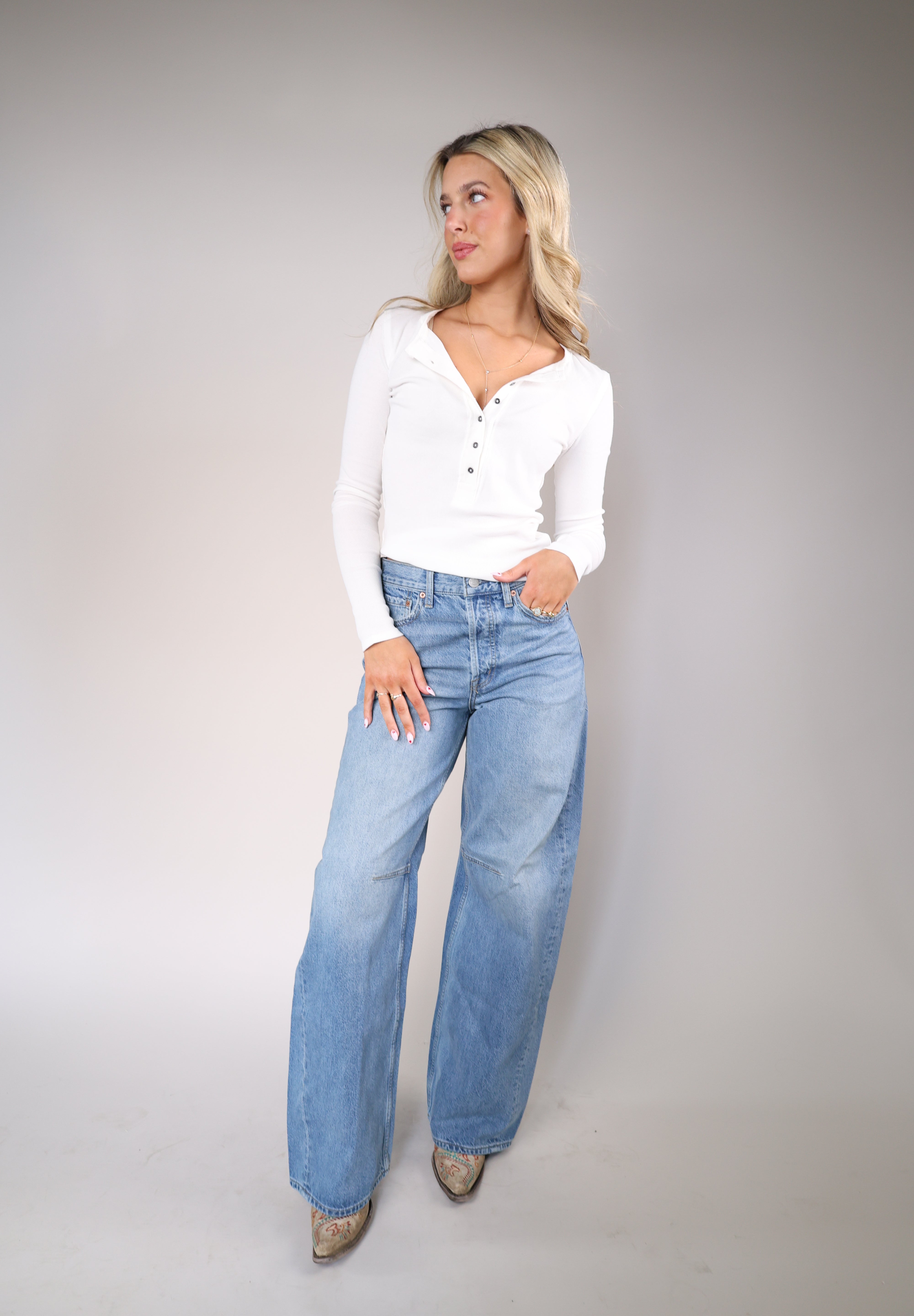 Free People Jamie Henley in white featuring ribbed knit fabric and classic button-front placket detail.