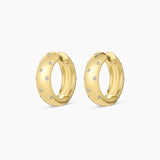 Gorjana Noel Shimmer Hoops — 18k gold-plated earrings with white CZ stones, 13/16” diameter and ¼” width, featuring a surgical steel post and hinge closure for a polished, sparkling finish.