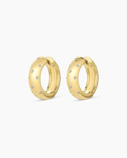 Gorjana Noel Shimmer Hoops — 18k gold-plated earrings with white CZ stones, 13/16” diameter and ¼” width, featuring a surgical steel post and hinge closure for a polished, sparkling finish.