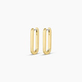 Gorjana Parker Huggies — sleek 18k gold or silver-plated earrings with a ⅞” drop, surgical steel post, and hinge closure for a modern, versatile look.