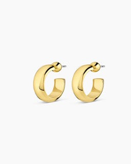 Gorjana Paseo Small Hoops — 18k gold-plated earrings with a ⅞” diameter and 5/16” width, featuring a surgical steel post and comfort backing for effortless, all-day wear.