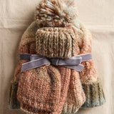 Free People Rainbow Run chunky knit beanie with pom pom and matching convertible mitten gloves featuring ribbed trim.