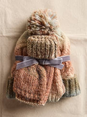 Free People Rainbow Run chunky knit beanie with pom pom and matching convertible mitten gloves featuring ribbed trim.