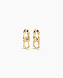 Gorjana Put a Charm On It Huggies — 18k gold-plated earrings with a 13/16” drop, surgical steel post, and hinge closure for a sleek, everyday look.
