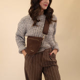 suede westlyn crossbody bag street wear outfit with sweater and trouser. women's fall outfit. mom friendly cool style