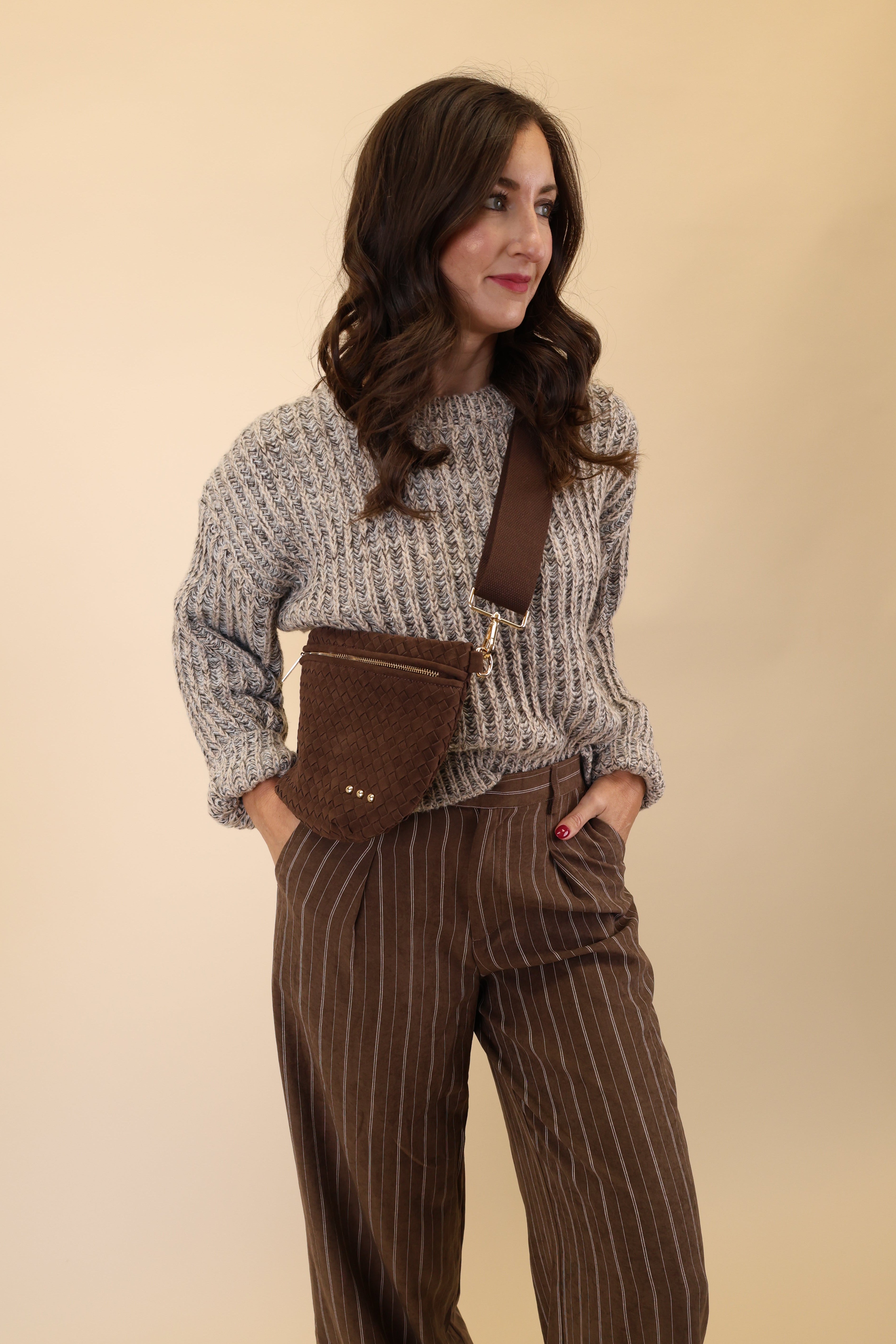 suede westlyn crossbody bag street wear outfit with sweater and trouser. women's fall outfit. mom friendly cool style