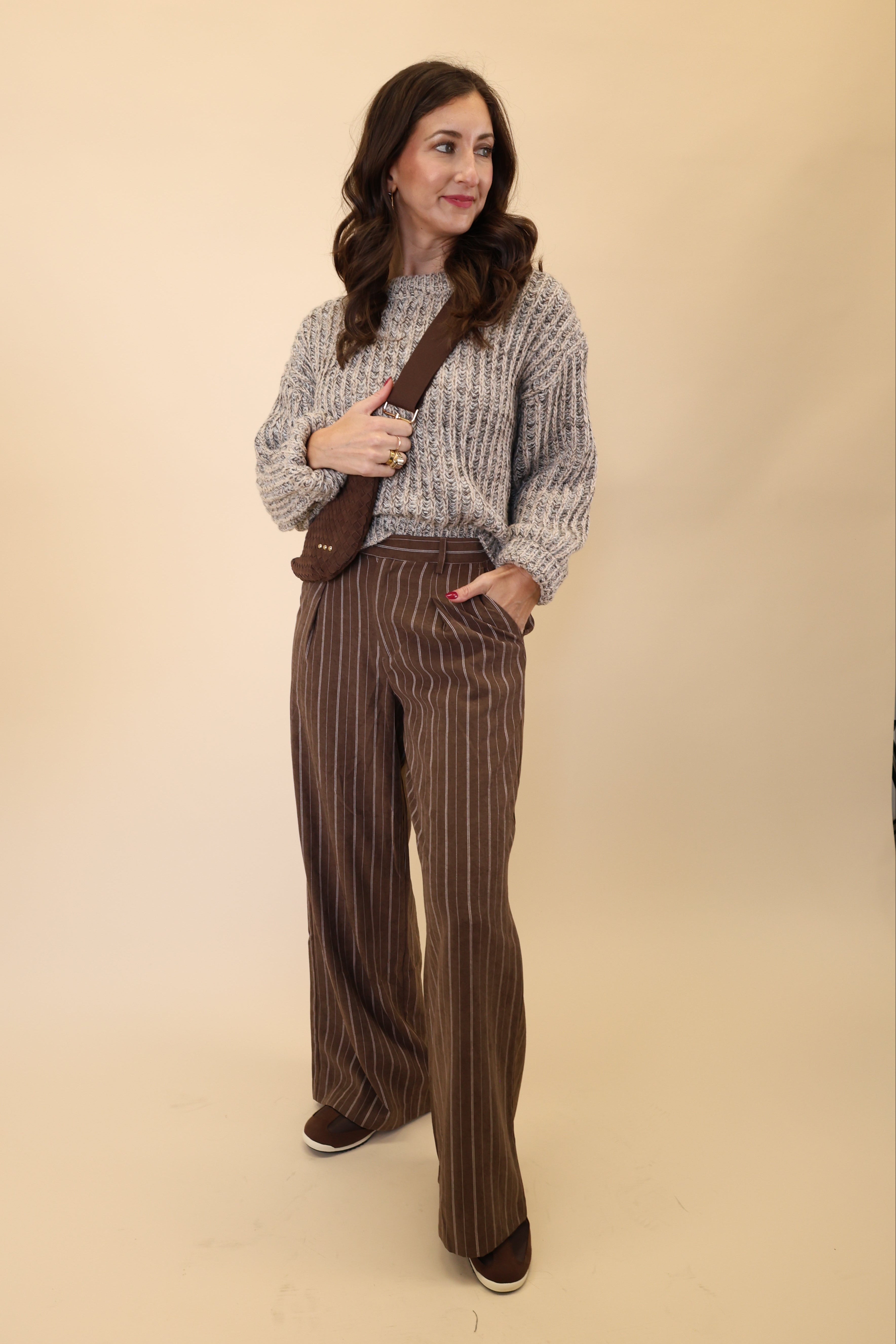 Z Supply Alma pant featuring a flowing wide-leg silhouette and classic brown-and-white pinstripes.