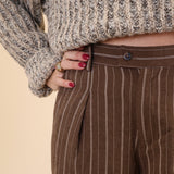 Brown wide-leg Z Supply pants with elegant white pinstripe detailing.