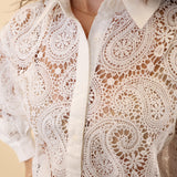 Dear John Suzette Top in white with soft lace, eyelet texture, and a flattering cropped shape.