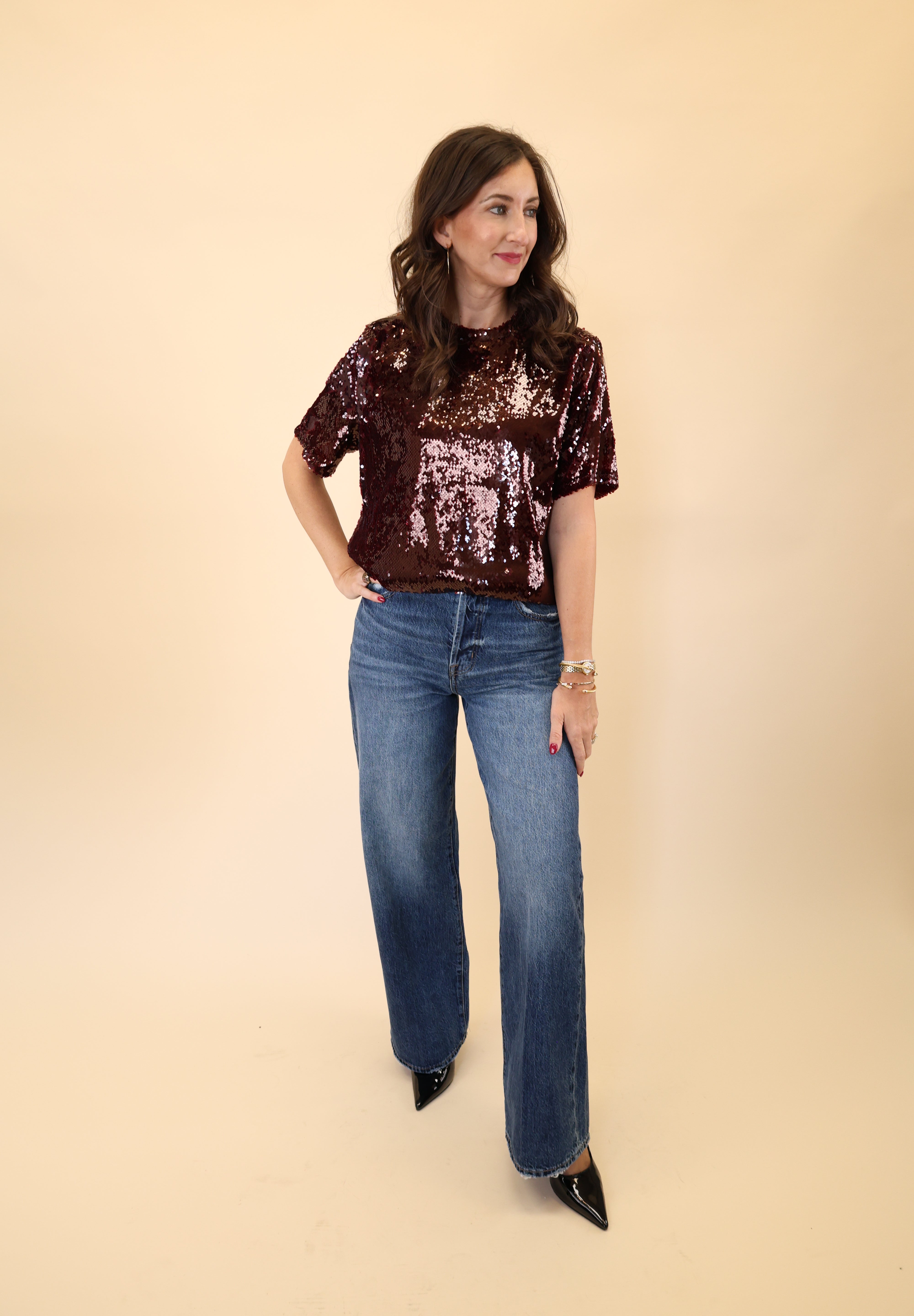 Sparkly brown DeLuc Logan Top with a flattering short-sleeve design.