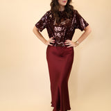 Silky red maxi skirt by Steve Madden featuring a smooth, elegant finish.