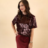 Brown sparkly DeLuc Logan Top, short-sleeved and eye catching. 
