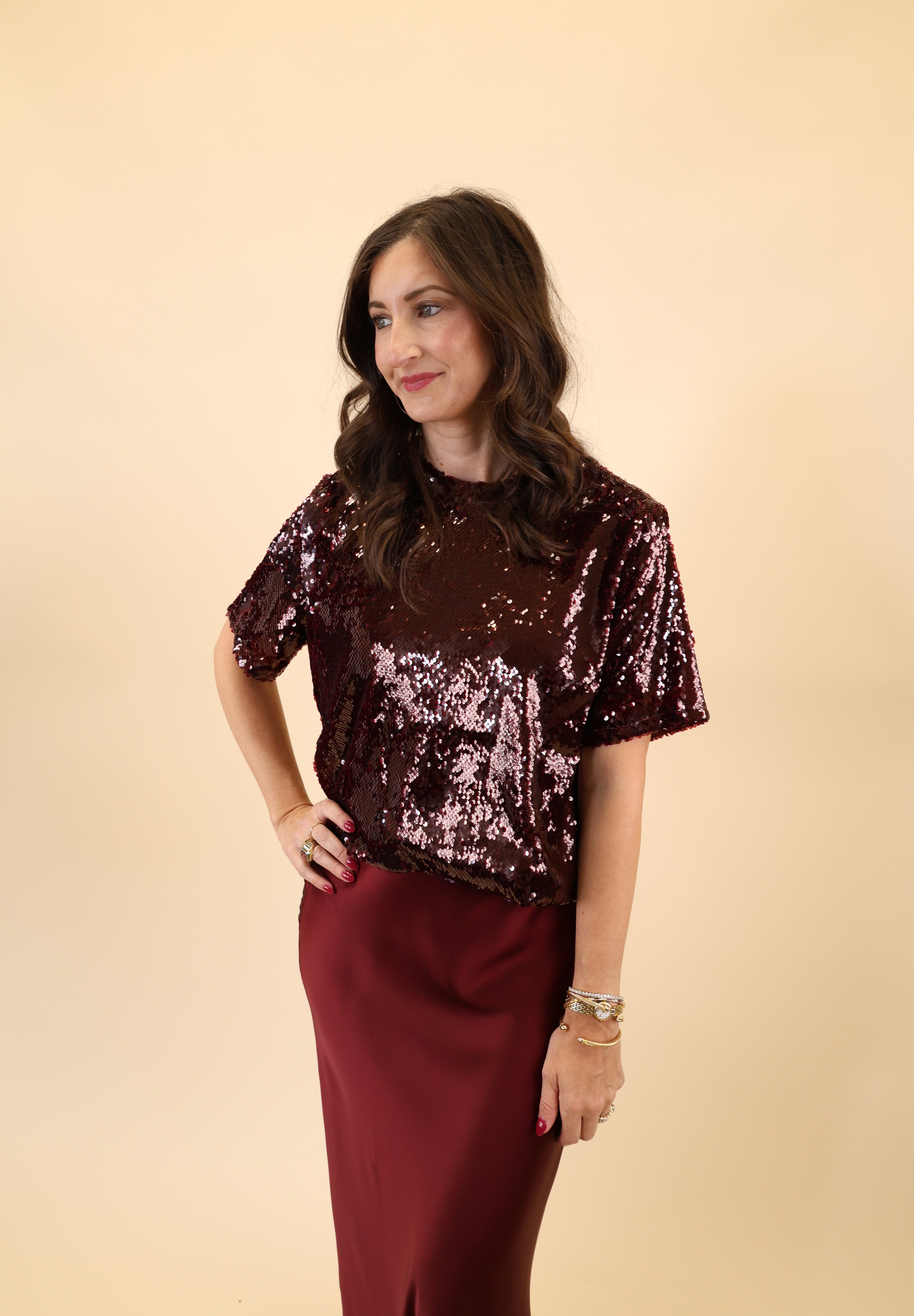Brown sparkly DeLuc Logan Top, short-sleeved and eye catching. 