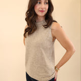 DeLuc Myles Knit Vest in soft beige fabric with a fuzzy texture, rhinestone embellishments, and a crew neckline.