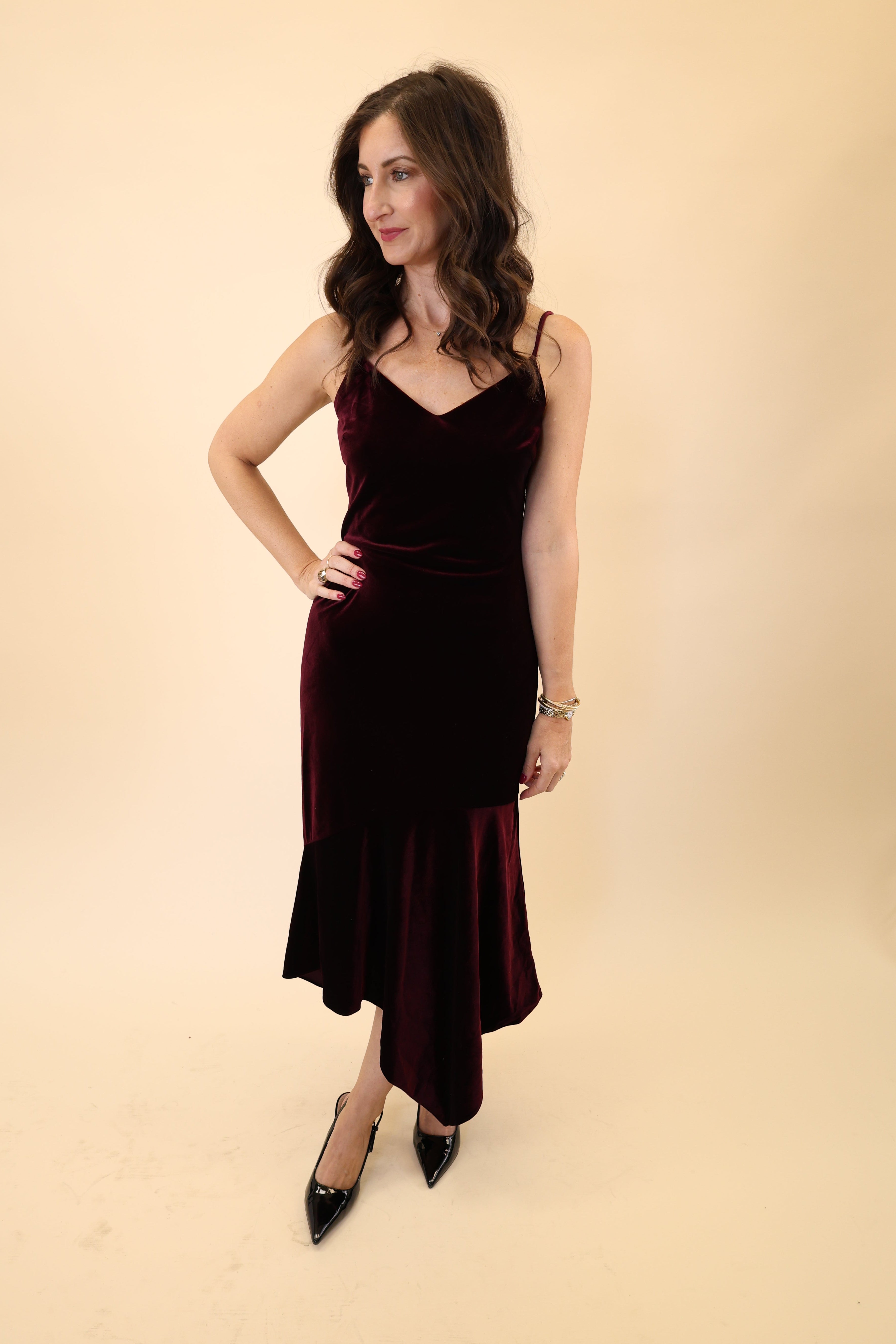 Burgundy velvet Steve Madden Lucille Dress showcasing a refined midi-length design. 