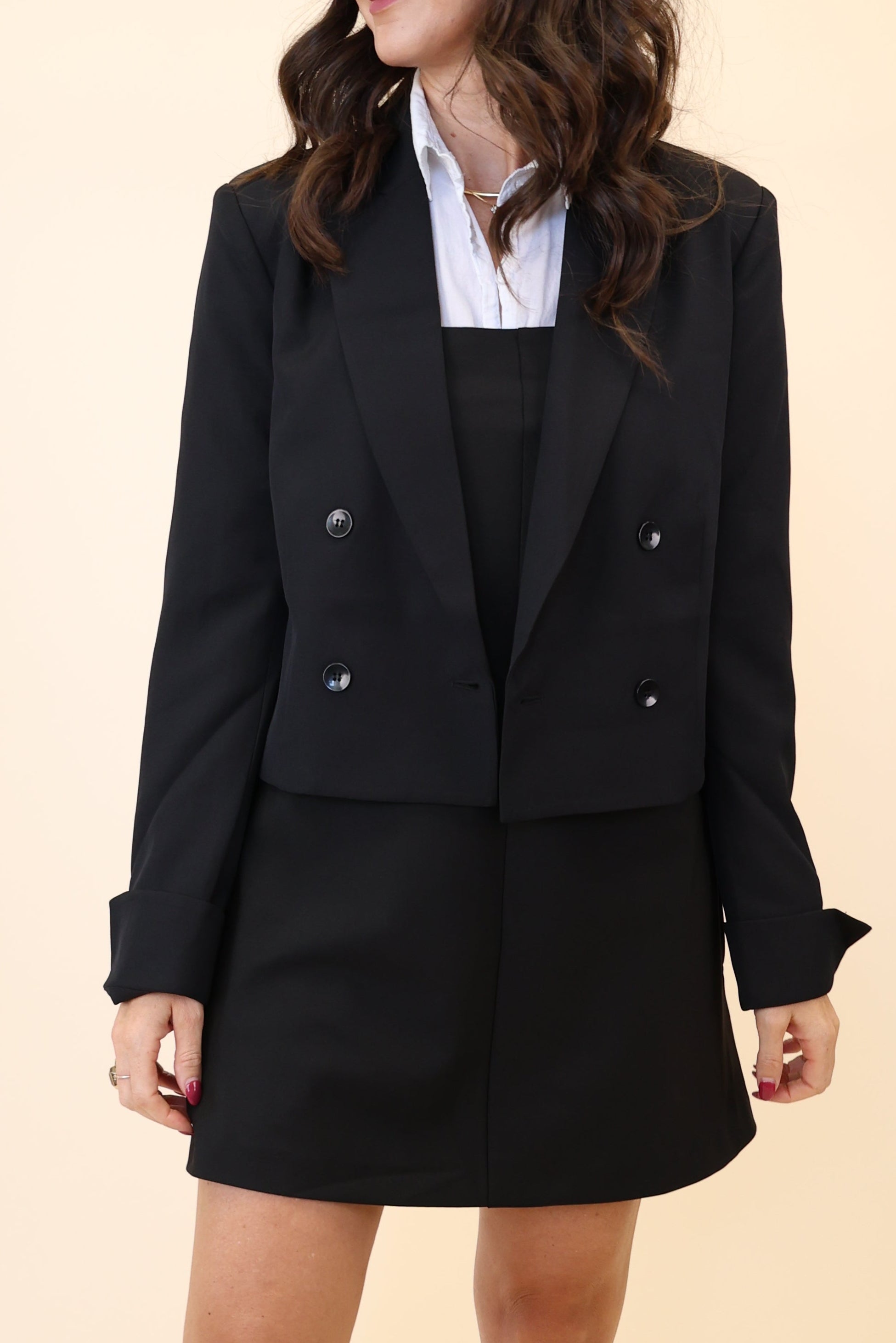 Chic black blazer by Steve Madden featuring a cropped length and modern double-breasted design