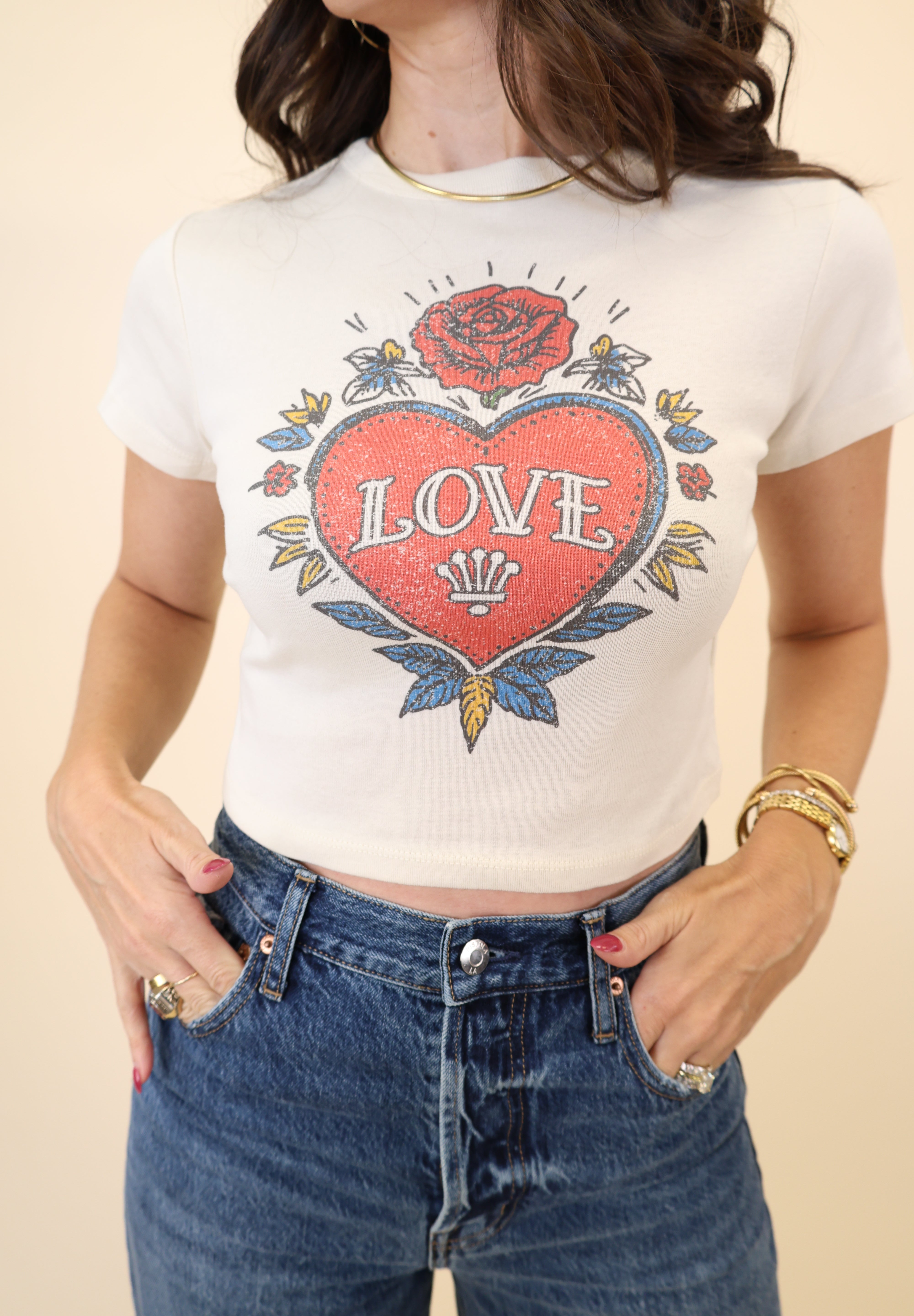 Fitted white cotton tee by Girl Dangerous featuring tattoo-style heart and “Love” design